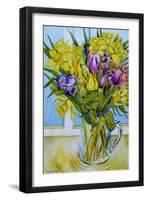 Daffodils and tulips in a glass jug by a window-Joan Thewsey-Framed Giclee Print