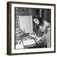Dalida Ccooking in Her Kitchen-Marcel Begoin-Framed Photographic Print