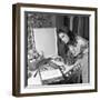 Dalida Ccooking in Her Kitchen-Marcel Begoin-Framed Photographic Print