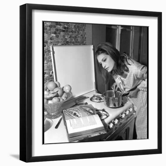 Dalida Ccooking in Her Kitchen-Marcel Begoin-Framed Photographic Print