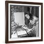 Dalida Ccooking in Her Kitchen-Marcel Begoin-Framed Photographic Print