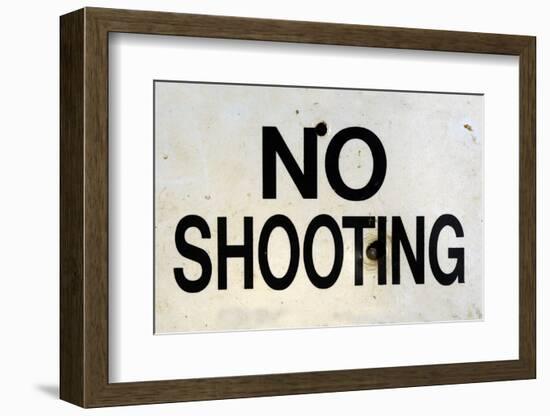 Damaged No Shooting Sign-Mr Doomits-Framed Photographic Print