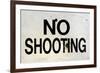 Damaged No Shooting Sign-Mr Doomits-Framed Photographic Print