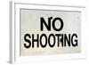 Damaged No Shooting Sign-Mr Doomits-Framed Photographic Print