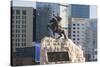 Damdin Sukhbaatar statue with skyscrapers in the background, Ulan Bator, Mongolia, Central Asia, As-Francesco Vaninetti-Stretched Canvas