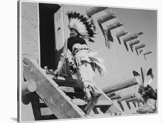 Dance San Ildefonso Pueblo New Mexico 1942 Two Indians In Headdress Ascending Stairs To House 1942-Ansel Adams-Stretched Canvas