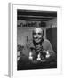 Dancer Jose Limon Seated at Candle Lit Table at His Home-Gjon Mili-Framed Premium Photographic Print