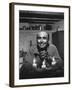 Dancer Jose Limon Seated at Candle Lit Table at His Home-Gjon Mili-Framed Premium Photographic Print