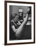 Dancer Mary Ellen Terry Talking with Her Legs Up in Telephone Booth-Gordon Parks-Framed Photographic Print