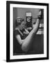 Dancer Mary Ellen Terry Talking with Her Legs Up in Telephone Booth-Gordon Parks-Framed Photographic Print