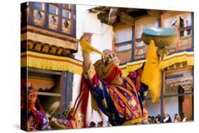 Dancers at Jakar Festival at Jakar Dzong, Bumthang, Bhutan-Howie Garber-Stretched Canvas