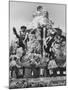 Dancers Do Matterhorn Act in Front of Artificial Slope at Disneyland-Ralph Crane-Mounted Photographic Print