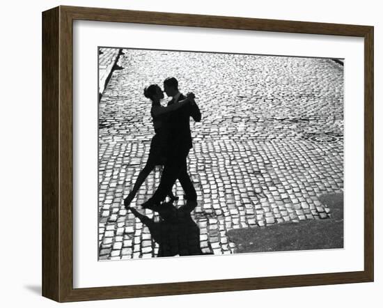 Dancers performing the Tango-null-Framed Art Print