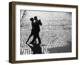 Dancers performing the Tango-null-Framed Art Print
