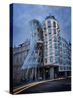 Dancing House (Fred and Ginger Building), by Frank Gehry, at Dusk, Prague, Czech Republic-Nick Servian-Stretched Canvas