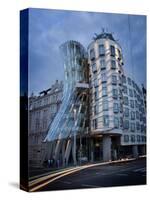 Dancing House (Fred and Ginger Building), by Frank Gehry, at Dusk, Prague, Czech Republic-Nick Servian-Stretched Canvas