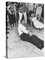 Dancing the Limbo at Party-Ralph Crane-Stretched Canvas