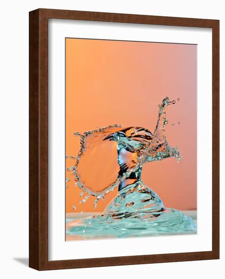 Dancing Water Droplet High Speed Photography on an Orange Background-Circumnavigation-Framed Photographic Print