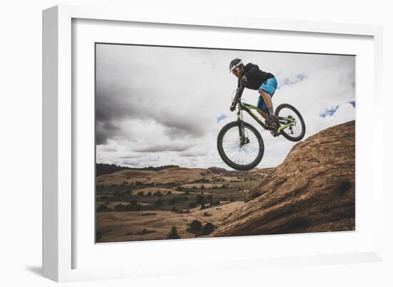 Dane Cronin Mountain Biking The Slickrock Trail In The Sand Flats Recreation Area, Moab, Utah-Louis Arevalo-Framed Photographic Print