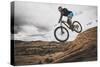 Dane Cronin Mountain Biking The Slickrock Trail In The Sand Flats Recreation Area, Moab, Utah-Louis Arevalo-Stretched Canvas