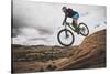 Dane Cronin Mountain Biking The Slickrock Trail In The Sand Flats Recreation Area, Moab, Utah-Louis Arevalo-Stretched Canvas