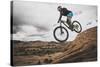 Dane Cronin Mountain Biking The Slickrock Trail In The Sand Flats Recreation Area, Moab, Utah-Louis Arevalo-Stretched Canvas