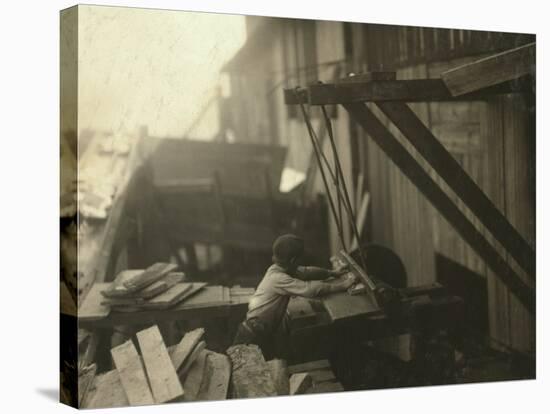 Dangerous Work - 12-Year Old Laborer at Miller and Vidor Lumber Company, Beaumont, Texas, c.1913-Lewis Wickes Hine-Stretched Canvas
