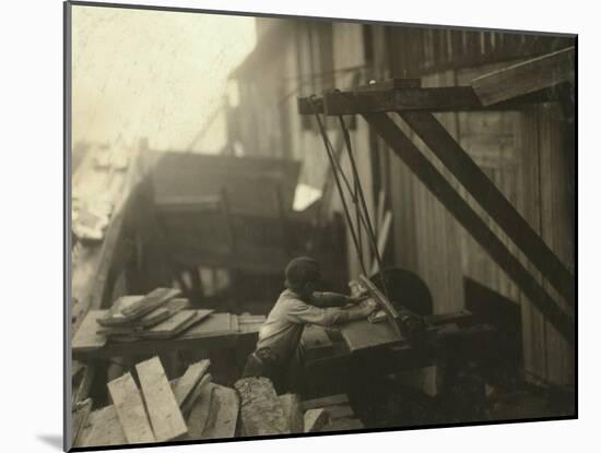 Dangerous Work - 12-Year Old Laborer at Miller and Vidor Lumber Company, Beaumont, Texas, c.1913-Lewis Wickes Hine-Mounted Photo