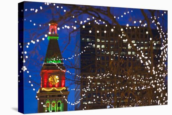 Daniels and Fisher Clock Tower with Christmas Lights, Denver, Colorado, USA-Walter Bibikow-Stretched Canvas