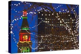 Daniels and Fisher Clock Tower with Christmas Lights, Denver, Colorado, USA-Walter Bibikow-Stretched Canvas