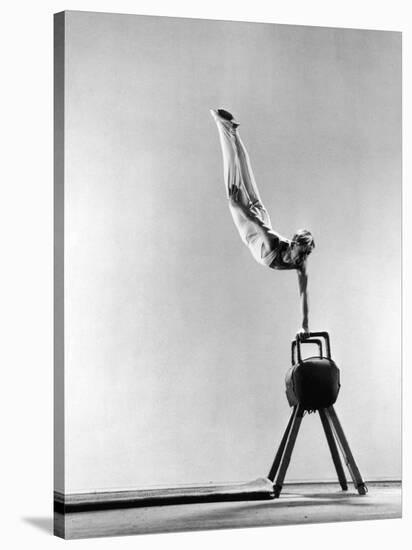 Danish Gymnastics Champion Hans Elmann Executing High Front Vault-Gjon Mili-Stretched Canvas