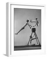 Danish Gymnasts Erik Hansen Followed by John Thomsen Do High Thief Jump as Team Member Braces Buck-Gjon Mili-Framed Photographic Print