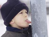 Boy Putting Tongue to Frozen Pole-Dann Tardif-Framed Photographic Print