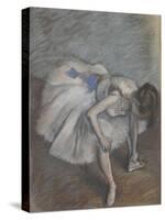 Danseuse assise,penchée en avant,elle se masse le pied gauche.-Edgar Degas-Stretched Canvas