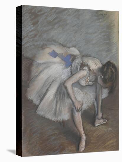 Danseuse assise,penchée en avant,elle se masse le pied gauche.-Edgar Degas-Stretched Canvas