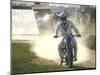 Daredevil Motorcyclist Evel Knievel Raising Dust after Completing Stunt-null-Mounted Photographic Print