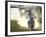 Daredevil Motorcyclist Evel Knievel Raising Dust after Completing Stunt-null-Framed Photographic Print