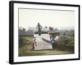 Daredevil Motorcyclist Evel Knievel Rising on Platform During Performance of Stunt-null-Framed Premium Photographic Print