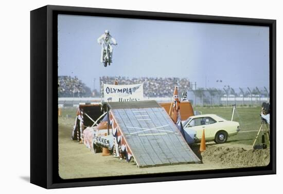 Daredevil Motorcyclist Evel Knievel Rising Very High Off Platform During Performance of a Stunt-Bill Eppridge-Framed Stretched Canvas