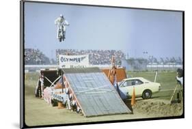Daredevil Motorcyclist Evel Knievel Rising Very High Off Platform During Performance of a Stunt-Bill Eppridge-Mounted Photographic Print