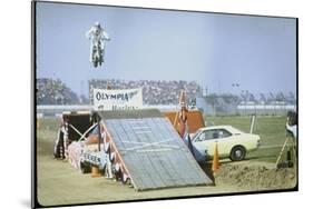 Daredevil Motorcyclist Evel Knievel Rising Very High Off Platform During Performance of a Stunt-Bill Eppridge-Mounted Photographic Print