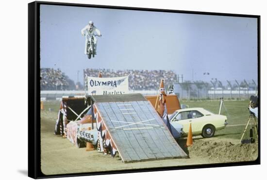 Daredevil Motorcyclist Evel Knievel Rising Very High Off Platform During Performance of a Stunt-Bill Eppridge-Framed Stretched Canvas