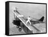 Daredevils Playing Tennis on a Biplane-null-Framed Stretched Canvas