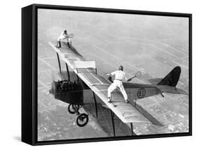 Daredevils Playing Tennis on a Biplane-null-Framed Stretched Canvas