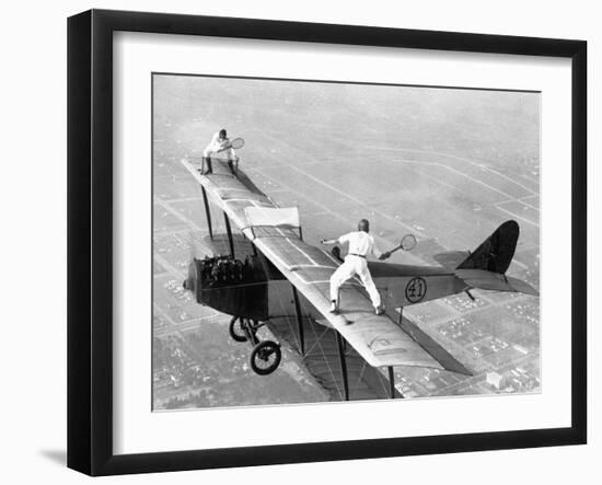 Daredevils Playing Tennis on a Biplane-null-Framed Premium Photographic Print