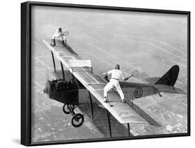 Daredevils Playing Tennis on a Biplane-null-Framed Photographic Print