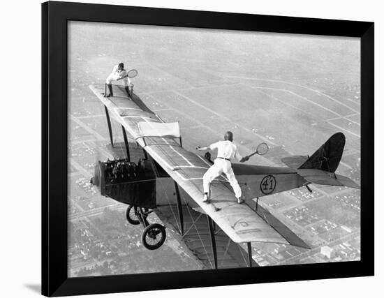 Daredevils Playing Tennis on a Biplane-null-Framed Photographic Print