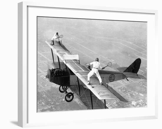 Daredevils Playing Tennis on a Biplane-null-Framed Photographic Print