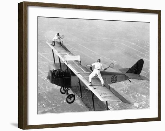 Daredevils Playing Tennis on a Biplane-null-Framed Photographic Print