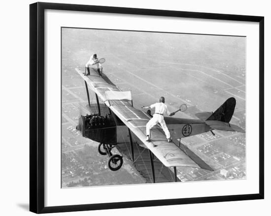 Daredevils Playing Tennis on a Biplane-null-Framed Photographic Print